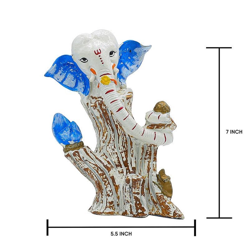 White & Blue Lord Ganesha Idol on Tree Log