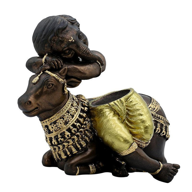 Baby Ganesha Idol Resting on Cow Antique with Golden Dhoti