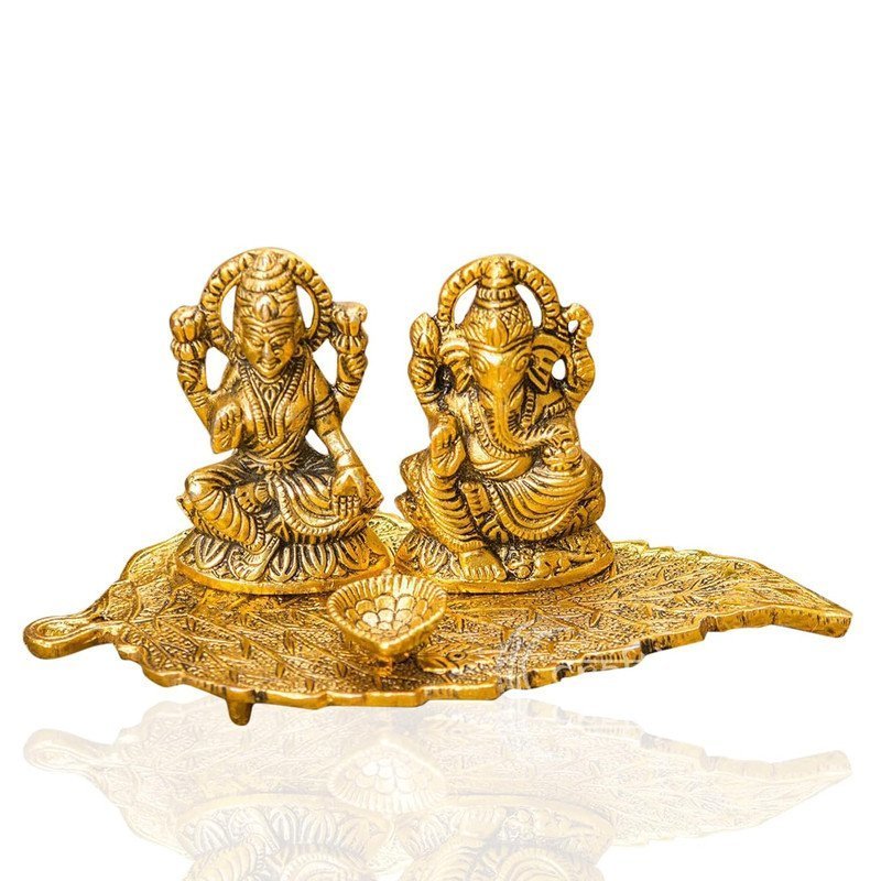 Brass Lakshmi Ganesha Diya on Leaf Plate