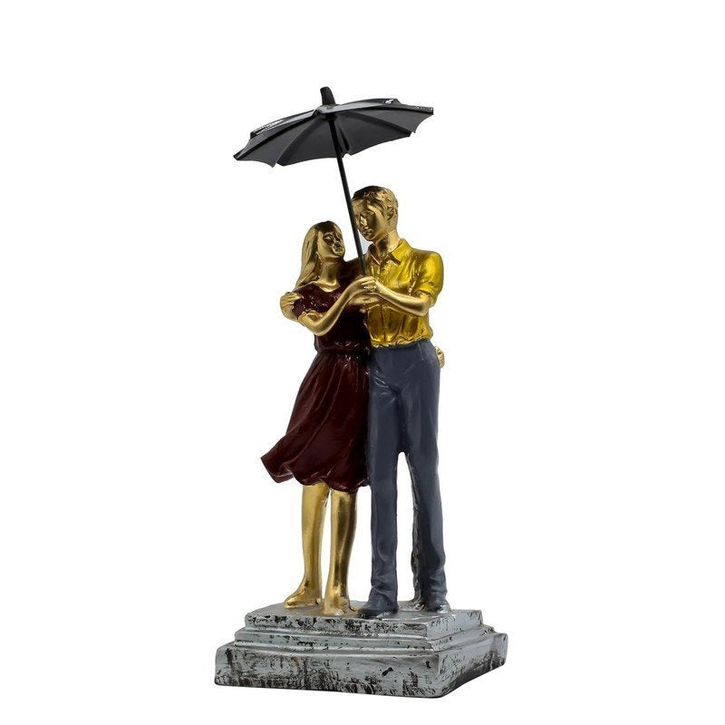 Hand-Painted Couple Under Umbrella Statue