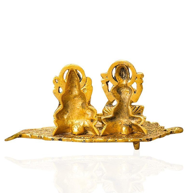 Brass Lakshmi Ganesha Diya on Leaf Plate