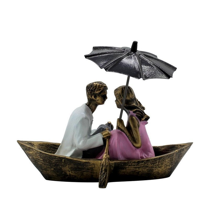 Hand-Painted Romantic Couple in Boat Statue