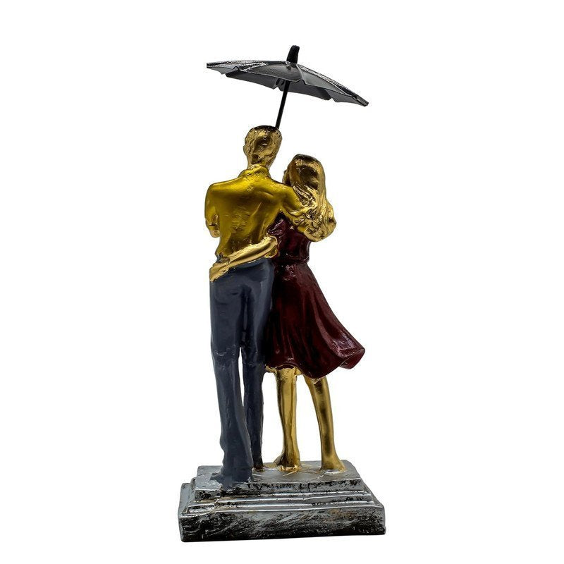 Hand-Painted Couple Under Umbrella Statue