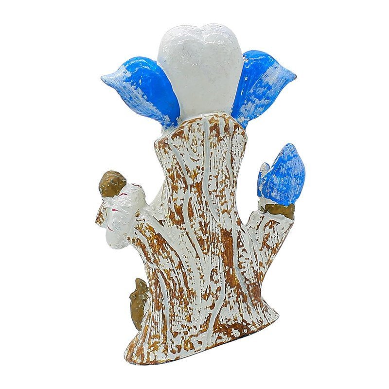 White & Blue Lord Ganesha Idol on Tree Log