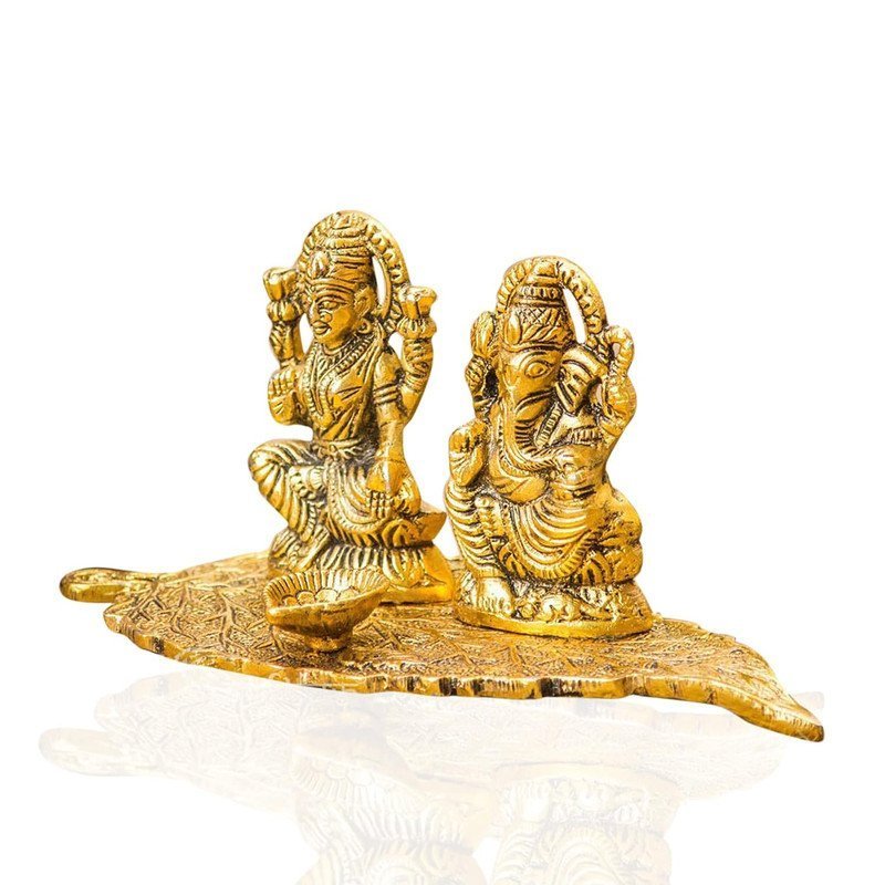 Brass Lakshmi Ganesha Diya on Leaf Plate