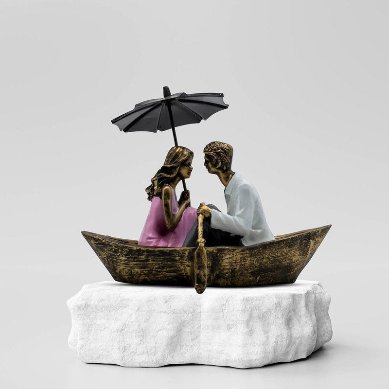 Hand-Painted Romantic Couple in Boat Statue