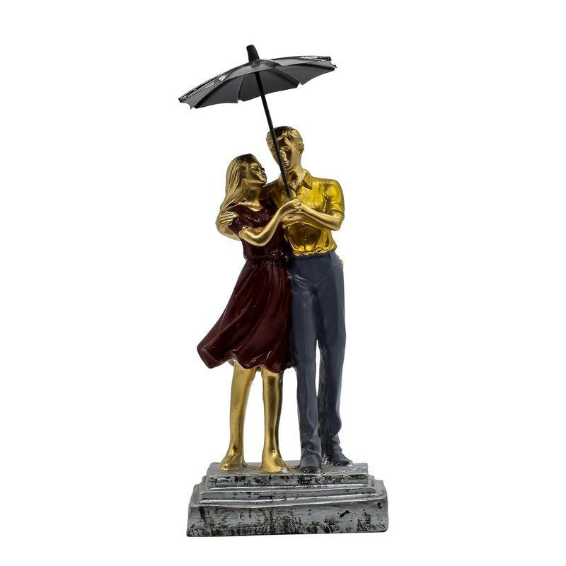 Hand-Painted Couple Under Umbrella Statue